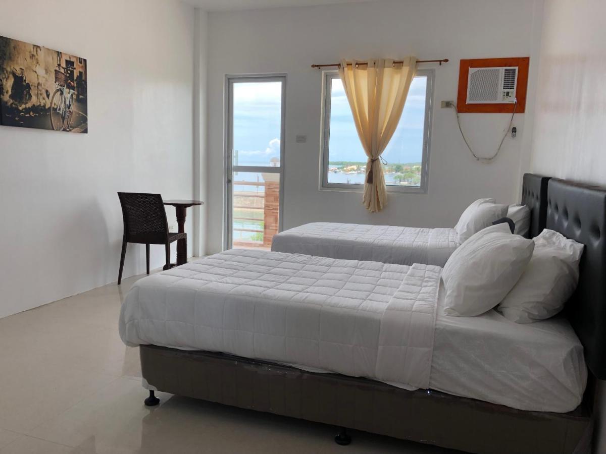 Arriyus Apartelle Daanbantayan Exterior foto