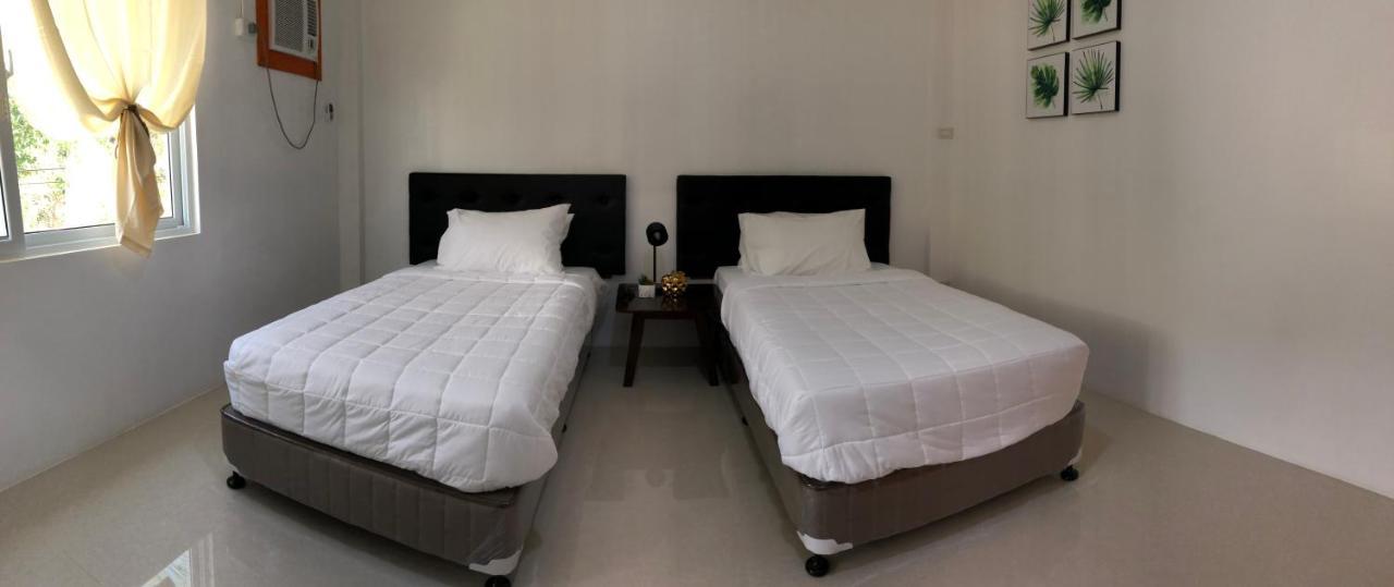Arriyus Apartelle Daanbantayan Exterior foto