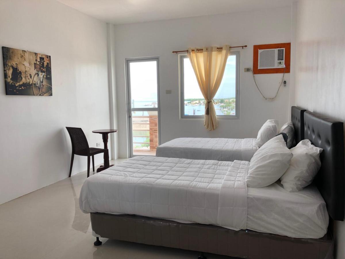Arriyus Apartelle Daanbantayan Exterior foto